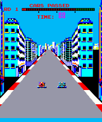 Turbo (Arcade) screenshot: Driving through the city.