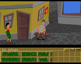 Skaut Kwatermaster (Amiga) screenshot: Village leader resting on the bench