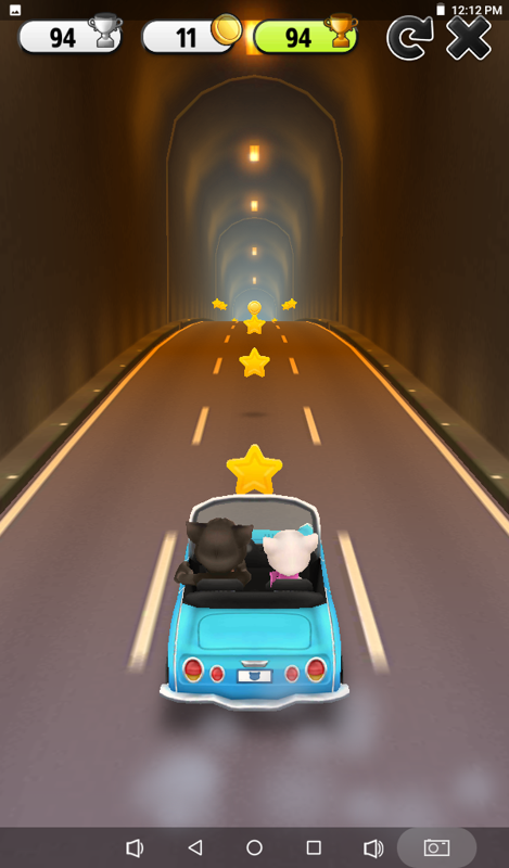 My Talking Tom (Android) screenshot: Hit the Road mini game: Tom and Angela are riding in a car and you must avoid obstacles.