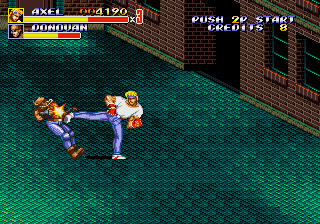 Streets of Rage 2 (Arcade) screenshot: Kick him.