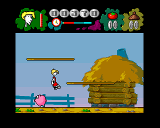 Mr. Tomato (Amiga) screenshot: Jumping over a pig