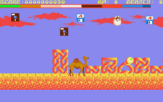 Return of the Mutant Camels (Amiga) screenshot: 3.5" and 5.25" disks against a camel