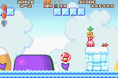 Super Mario Advance (Game Boy Advance) screenshot: Hit the bubble to release the 1up mushroom