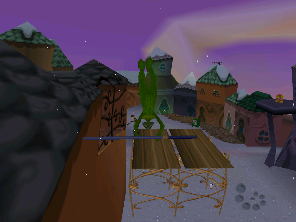 The Grinch (Windows) screenshot: The Grinch can swing on poles and jump from them.