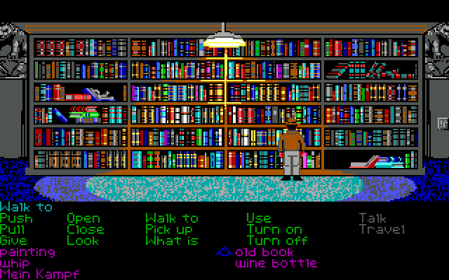 Indiana Jones and the Last Crusade: The Graphic Adventure (DOS) screenshot: In the library (EGA) - the shelves look beautiful, but actually looking for the correct books is very labor-intensive.