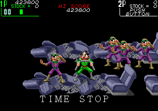 The Ninja Kids (Arcade) screenshot: Time stops, allowing one ninja to kick back