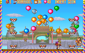 Pang Pom's (Arcade) screenshot: That little guy is a 1up