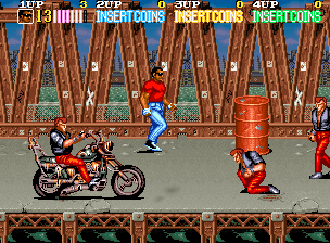Vendetta (Arcade) screenshot: Motorbike rides past