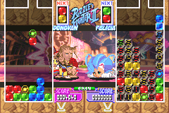 Super Puzzle Fighter II Turbo (Game Boy Advance) screenshot: Sad Felicia, happy Donovan