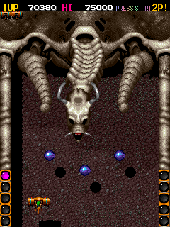 Ghox (Arcade) screenshot: First boss fight