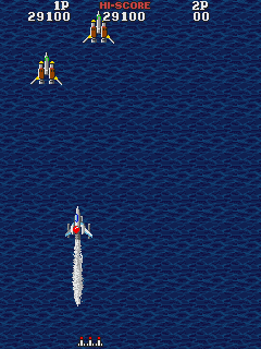 Asuka & Asuka (Arcade) screenshot: Shoot or avoid the planes.
