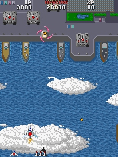 Asuka & Asuka (Arcade) screenshot: Approaching land.