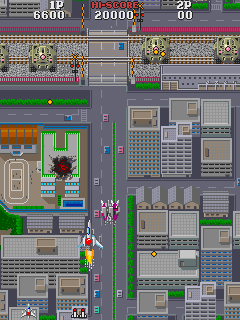 Asuka & Asuka (Arcade) screenshot: Tanks to destroy.