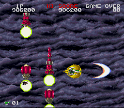 Darius Twin (SNES) screenshot: Avoid these giant rockets