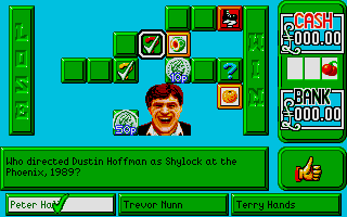 Emlyn Hughes Arcade Quiz (Atari ST) screenshot: This is how happy he looks when you give the right answer