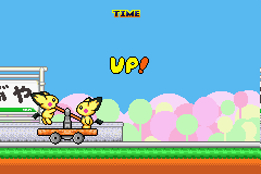 Tokotoko Truck (Game Boy Advance) screenshot: Passing a train station to gain extra time.