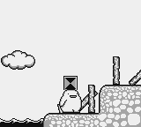 Nōbow (Game Boy) screenshot: The gameplay: Noobow picks things up and puts them on his head.