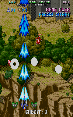 Hotdog Storm (Arcade) screenshot: Shooting over cliffs