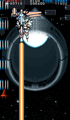 Rapid Hero (Arcade) screenshot: A boss with a giant laser that will drive you to the side of the screen.