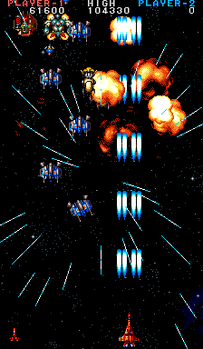 Rapid Hero (Arcade) screenshot: Firing with an upgraded weapon.