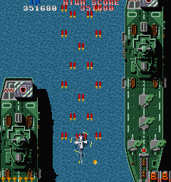 Twin Cobra (Sharp X68000) screenshot: Even out on the sea everyone is trying to kill you