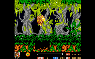 Toki (Amiga) screenshot: Jumping over some dangerous spikes.