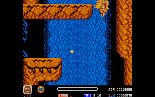 Toki (Atari ST) screenshot: A gigantic weight has just landed on a see-saw, propelling me up, up, up!