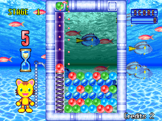 Puzzle Uo Poko (Arcade) screenshot: Let's start playing! Pulling down on the chain using the joystick compresses the spring, while letting go lets the ball go flying.