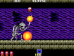 Rad Action (Arcade) screenshot: Killed by a giant skeleton