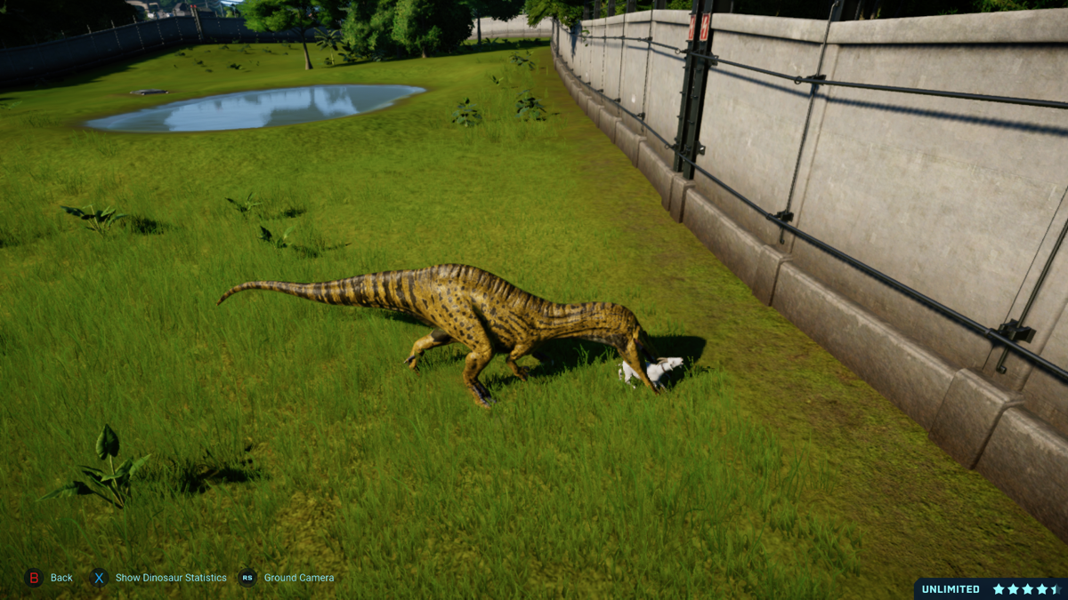 Jurassic World: Evolution - Dinosaur Pack (Xbox One) screenshot: A Suchomimus hunting a goat