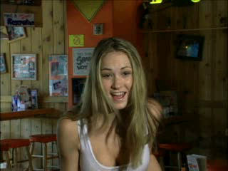 Hooters: Road Trip (PlayStation) screenshot: She's very excited (horny) because of my arrival. "...welcome to Jacksonville!".