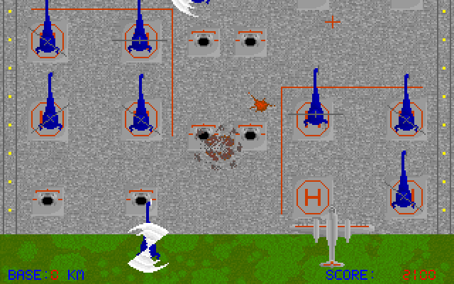 Bomber (DOS) screenshot: Here we have reached the first levels enemy base area, filled with helicopters and guns. (There are three levels according to the manual)