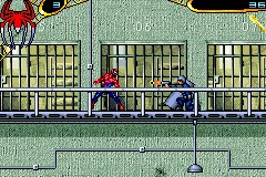 Spider-Man 2 (Game Boy Advance) screenshot: Why is the officer shooting me? I came to stop the riot, not help it!