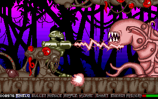 Under Pressure (Amiga) screenshot: Using welding machine on a pink alien