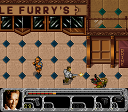 True Lies (SNES) screenshot: Harry can roll to dodge bullets, and come up firing.
