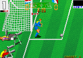 Super Soccer Champ (Arcade) screenshot: Goal kick and yes, the photographers on the side can get knocked down by the ball