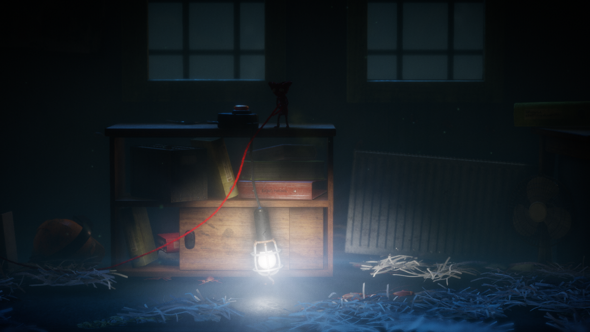 Unravel (Windows) screenshot: This place is filled with deadly cockroaches, and the lamp is your only protection