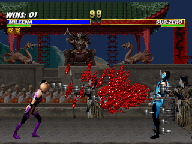 Mortal Kombat Trilogy (PlayStation) screenshot: Mileena finishes off Classic Sub-Zero spitting at full speed a countless set of blooding nails.
