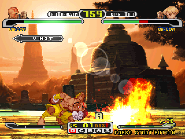 Capcom vs. SNK Pro (PlayStation) screenshot: Dhalsim surrounds the ground with his Super Combo Yoga Stream and connects 4 burning hits in King.