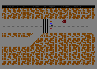 Formula 1 (Atari 8-bit) screenshot: Start of the race: the colored objects are the cars.