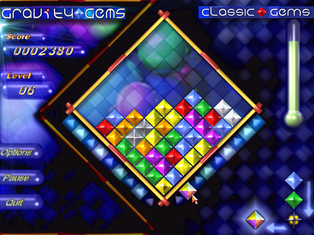 Gravity Gems (Windows) screenshot: The active gem is a wildcard, which will react with any color