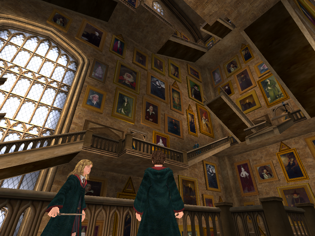 Harry Potter and the Prisoner of Azkaban (Windows) screenshot: The moving staircases and talking pictures (they don't talk in the game)