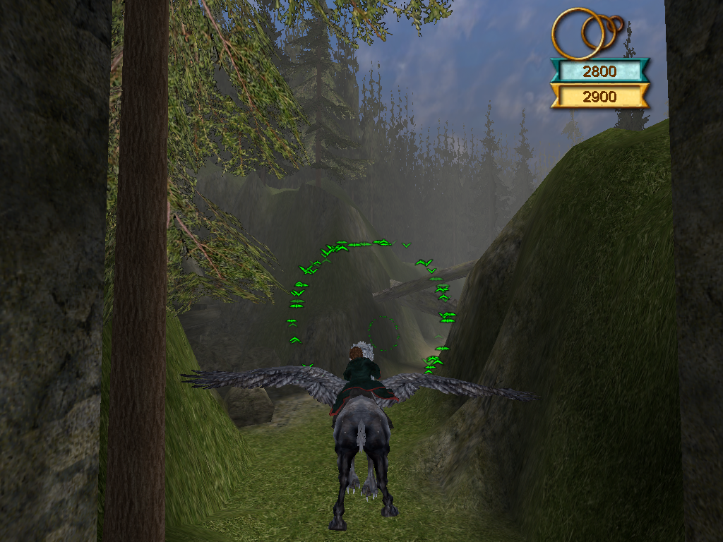 Harry Potter and the Prisoner of Azkaban (Windows) screenshot: Flying Buckbeak around... go through enough of the rings to complete the courses