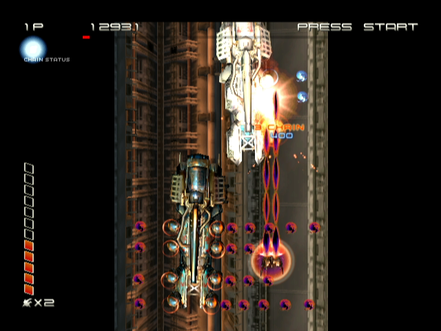 Ikaruga (GameCube) screenshot: Attacking some large craft