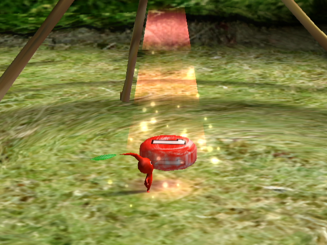 Pikmin (GameCube) screenshot: The onion absorbs objects to create more Pikmin.