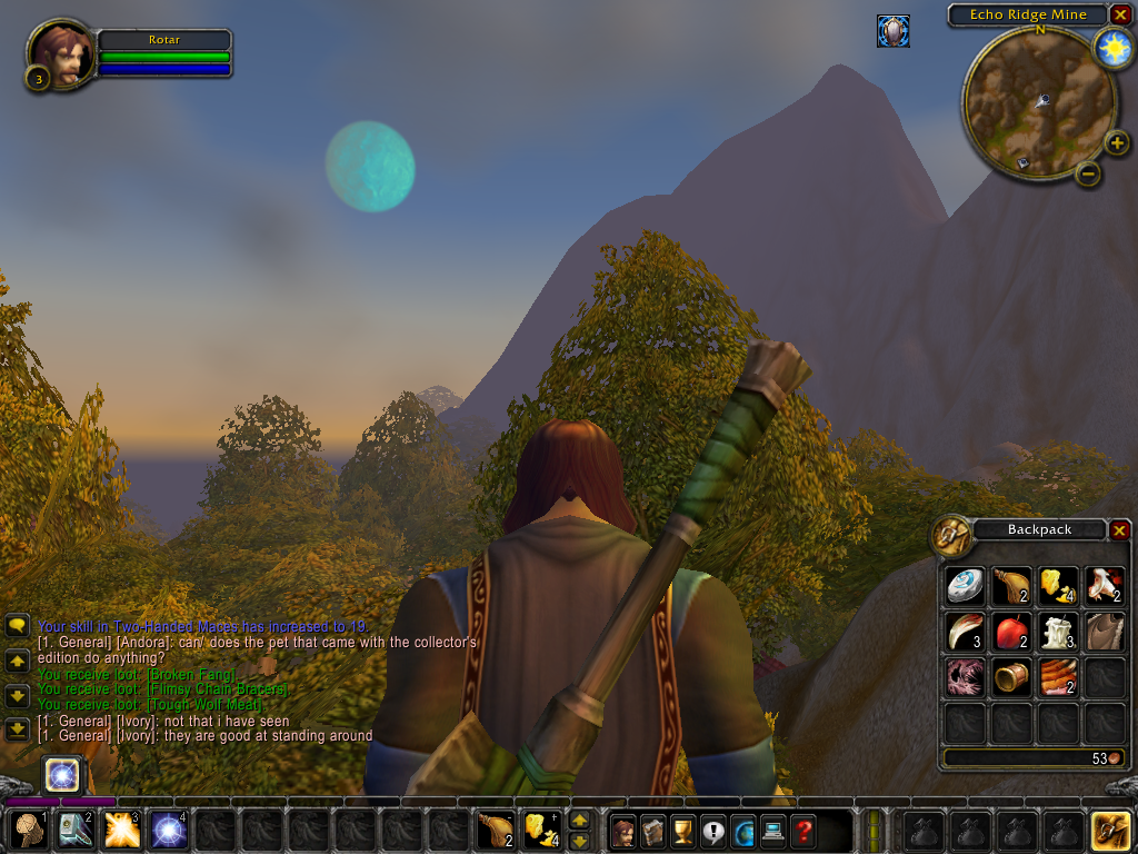 World of WarCraft (Windows) screenshot: Looking out over the treetops at the evening sky
