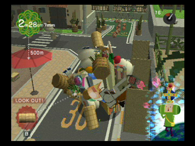 We ♥ Katamari (PlayStation 2) screenshot: The streets are typically filled with random stuff to roll up