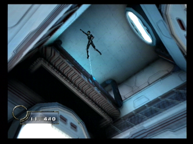 Æon Flux (PlayStation 2) screenshot: Leaping into the air on a line.