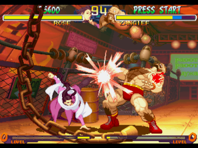 Street Fighter Collection (PlayStation) screenshot: Rose meets Zangief's guard totally open and decides to attack him with a bloody-single Strong Kick.