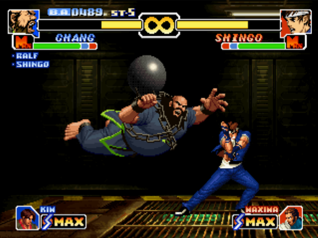 The King of Fighters '99: Millennium Battle (PlayStation) screenshot: This time, Shingo Yabuki is ready to block Chang Koehan's DM Tekkyuu Dai Assatsu: let's get it on!